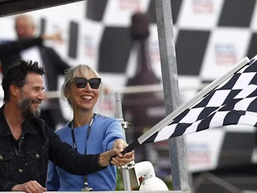 Keanu Reeves leaves fans excited with recent public appearance with girlfriend Alexandra Grant at racing event in Germany - See viral photos | English Movie News - Times of India