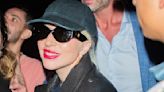 Lady Gaga blows kisses to fans outside hotel in Paris