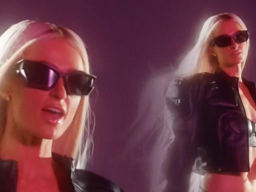 Paris Hilton gyrates in black leather underwear for music video transformation