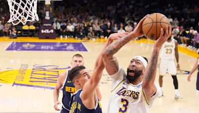 LeBron scores 30, and the Lakers avoid 1st-round elimination with a 119-108 win over champion Denver