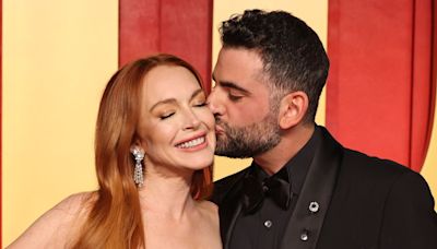 Lindsay Lohan's fans say the same thing as she cozies up to husband Bader Shammas in photos from lavish 38th birthday party