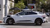 Videos show San Francisco crowd destroying Waymo robotaxi months after rival Cruise forced off roads by accident injuring pedestrian