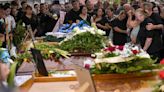 Serbia mourns as funerals for mass shooting victims begin