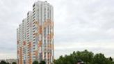 A worker installs solar panels during a blackout in Kyiv