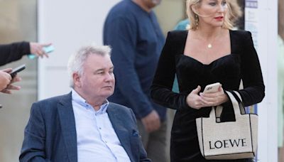 Eamonn Holmes takes to his wheelchair with girlfriend on glam day out in Ibiza