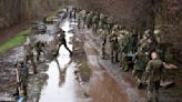 German soldiers help fill sandbags in flood district in Saxony-Anhalt