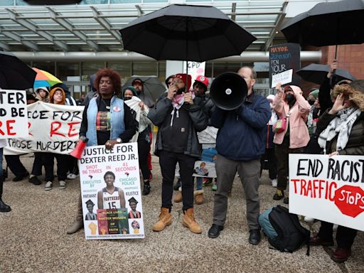 Protesters appear at testy Chicago Police Board meeting to call for firing of officers involved in killing of Dexter Reed