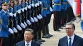 Xi and his wife Peng Liyuan were greeted by Vucic on a red carpet outside the main government offices