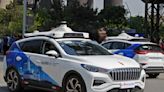 A driverless car hits a person crossing against the light in China