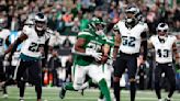 Hall runs for a TD after Adams' INT and Jets shock Eagles 20-14 to send Philly to its first loss