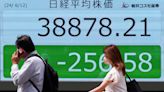 Stock market today: Asian shares are mixed ahead of a Fed decision on interest rates