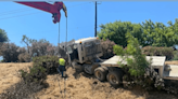 Big rig goes up embankment on highway in Fresno County, CHP says