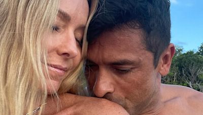 Shirtless Mark Consuelos kisses Kelly Ripa’s bare shoulder in beach pic