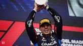 Verstappen holds off charging Norris to win at Imola