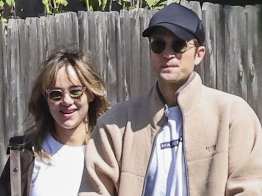 Robert Pattinson & Suki Waterhouse Enjoy a Sunday Stroll with Their Newborn Baby