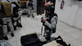 Hallan en cuartel de la Guardia Nacional 48 mil dólares en efectivo y armas sin registrar | El Universal