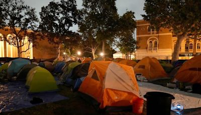 LAPD officers in riot gear remove tents, clear pro-Palestinian encampment at USC