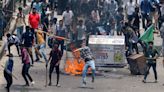 Bangladesh protests: 300 police injured in clashes with 'hundreds of thousands' of protesters