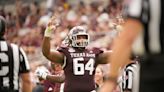 Texas A&M OL Layden Robinson meets with Texans