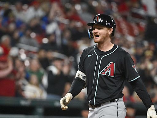 D-backs Power to 14-1 Victory Behind Henry's Strong Outing