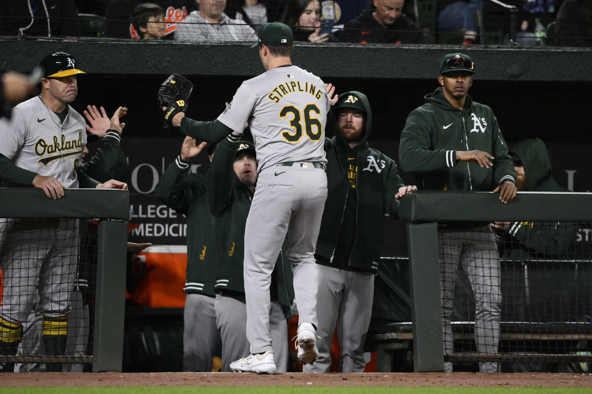 Brent Rooker hits a go-ahead double in the 10th to carry the Athletics past the Orioles 3-2