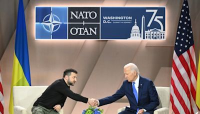 At NATO summit, allies delicately lend Biden a hand