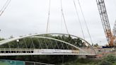 Massive new bridge over the River Severn is craned into place