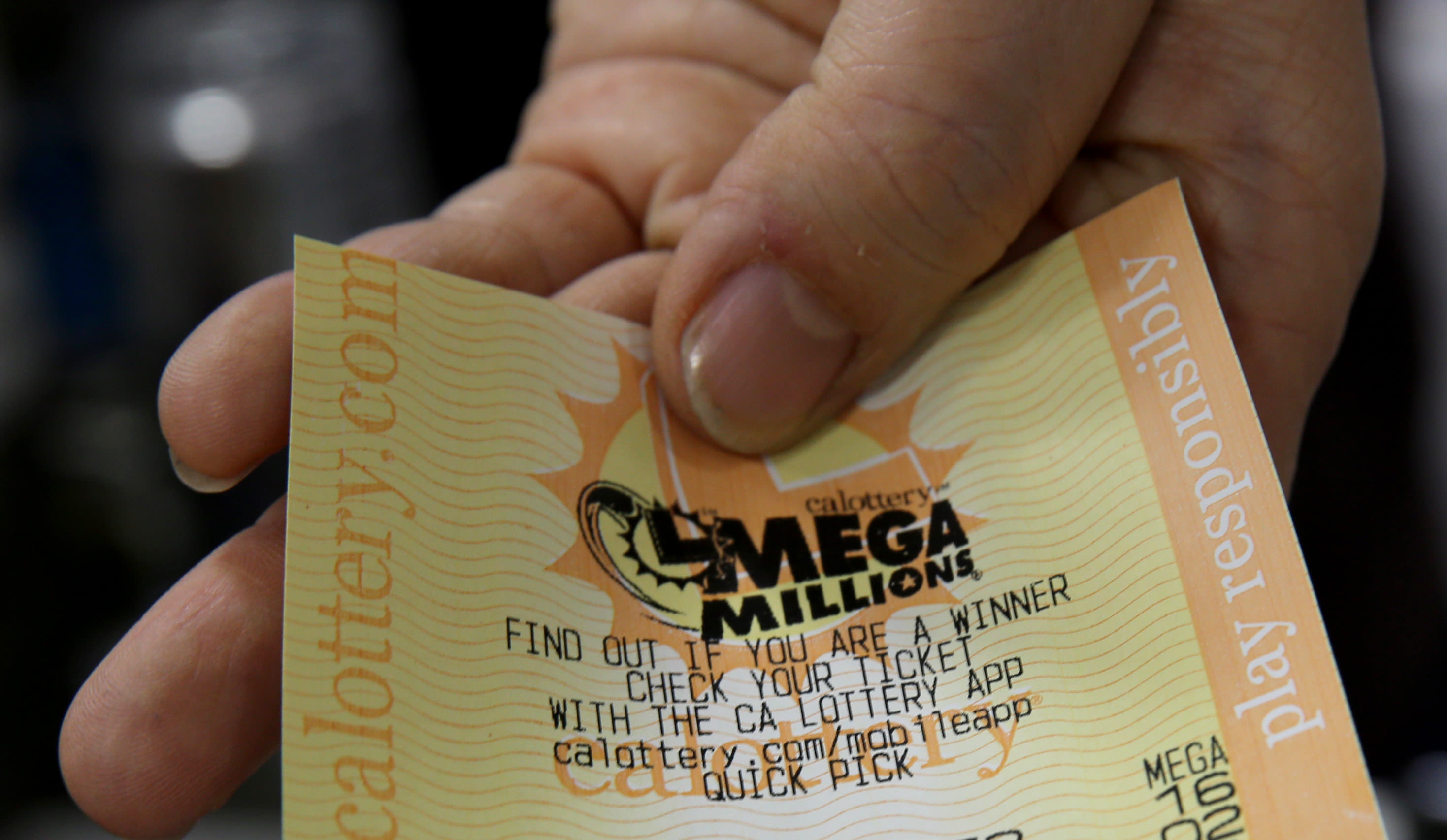 Gas-station quick pick nets Mega Millions player $810 million