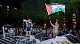 Hundreds of protesters overrun barricades blocking off pro-Palestinian encampment