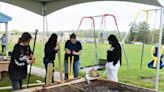 Working the Soil: Volunteers improve raised gardens at Zane Grey