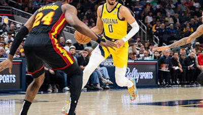 Pacers rout Hawks to lock up playoff berth