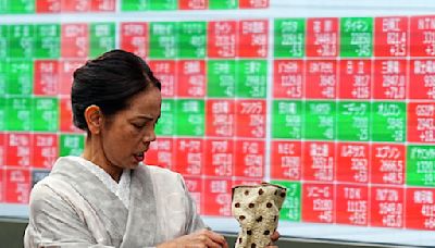 Asian shares mixed as jitters calm over global markets while uncertainty lingers - The Morning Sun