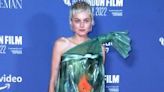 In the Bag! Emma Corrin Wears Goldfish Dress to 'My Policeman' Premiere