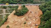 Death toll jumps to at least 48 as a search continues in southern China highway collapse