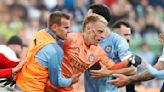 Australian A-League match turns violent as fans invade pitch, attack goalie