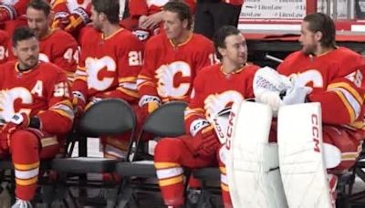 "How much did you pay for that haircut?" Flames chirp Mangiapane on team photo day