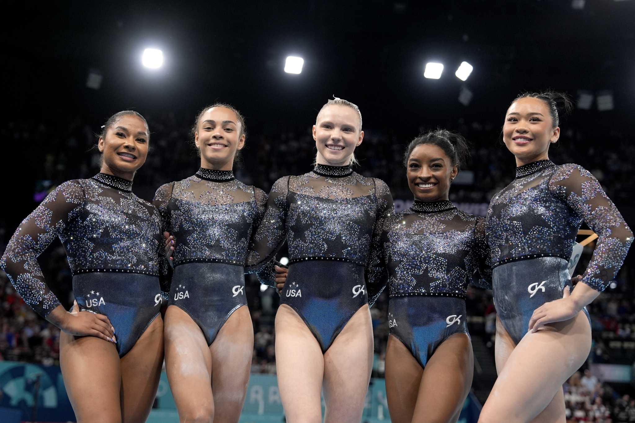 The Latest: Simone Biles and Team USA win women's gymnastics team gold