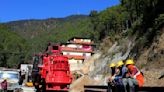 Digging to rescue 41 workers trapped in a collapsed tunnel in India halted after machine breaks