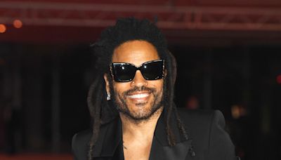 Lenny Kravitz’s Trainer Explains Why Singer Wears Leather Pants to the Gym: ‘He’s Different’