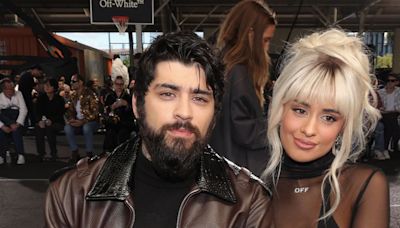 One Direction's Zayn Malik is barely recognisable as he attends fashion show with Camila Cabello