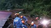 At least 12 killed and dozens feared trapped as Malaysia landslide sweeps through campsite