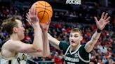 LOOK: Michigan State basketball big man Carson Cooper sporting face mask for NCAA Tournament