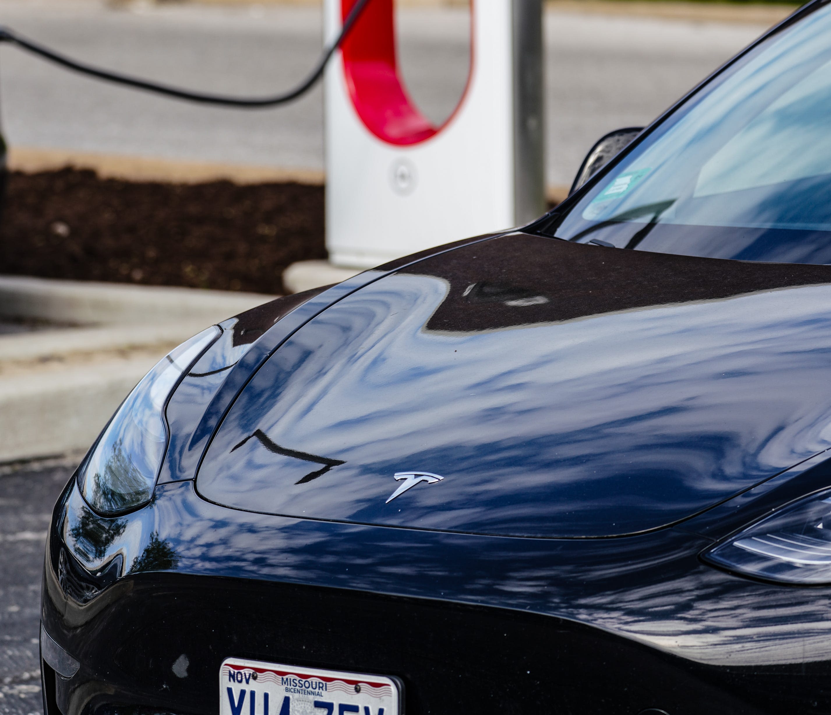 Tesla that fatally hit Washington motorcyclist may have been in autopilot; driver arrested