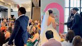 Bride and Groom Surprise Wedding Guests with Rings Under Seats and Random Ring Bearer (Exclusive)