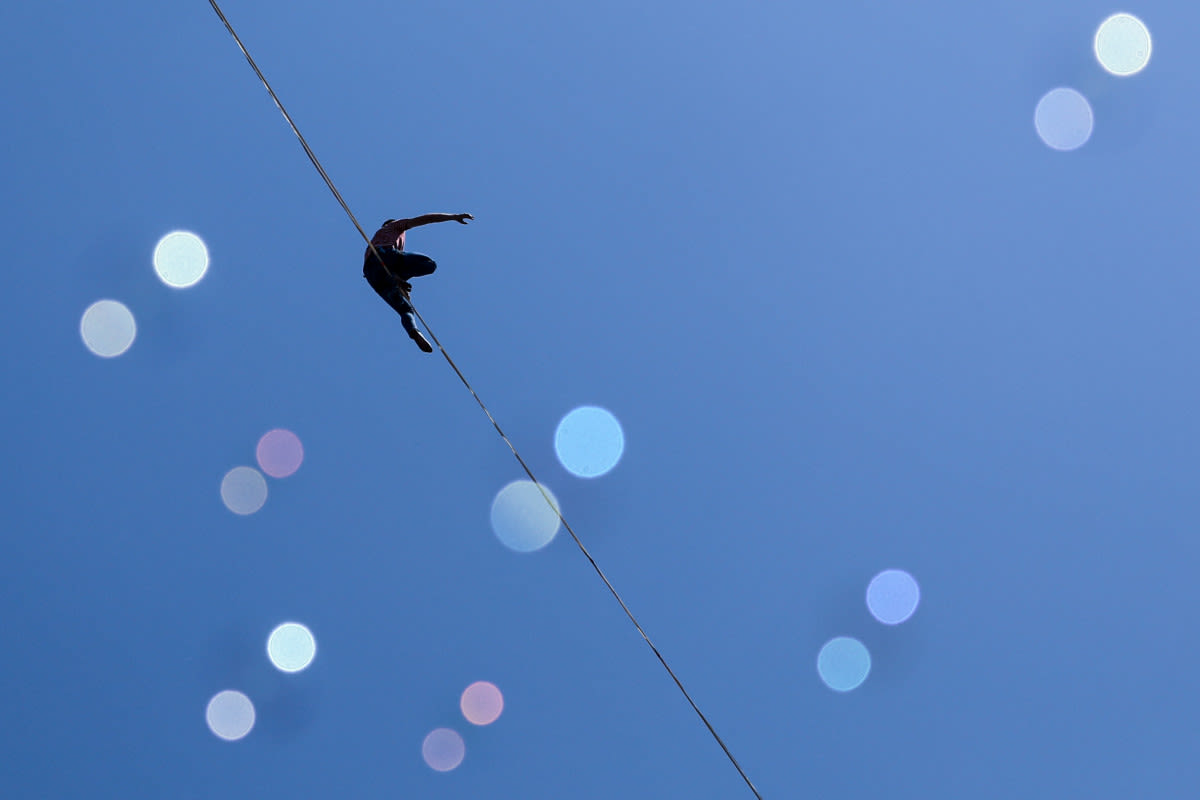 Daredevil Makes Harrowing Tightrope Walk Between Abandoned High Rise Buildings