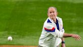 George W. Bush has a little bounce as he throws ceremonial first pitch to start World Series