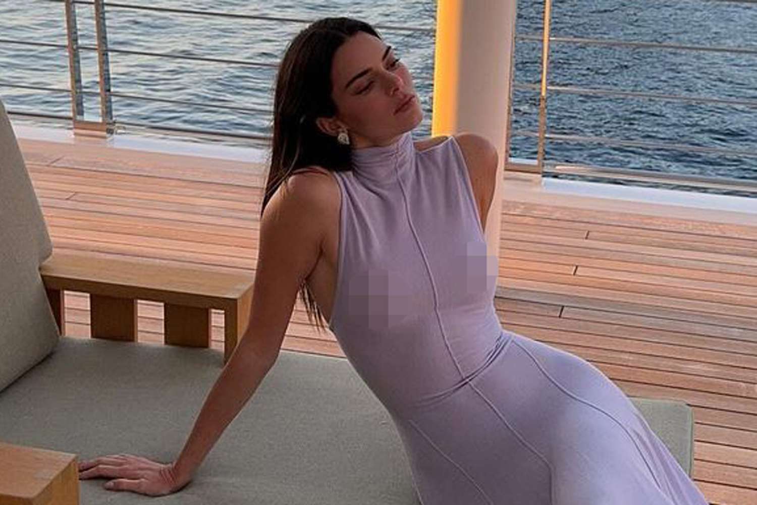 Khloé Kardashian Reacts to Kendall Jenner Posing in a Nipple-Baring Dress on a Yacht: ‘Best Nips in Town’