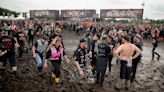 German heavy metal festival halts admissions as rain turns site to mud