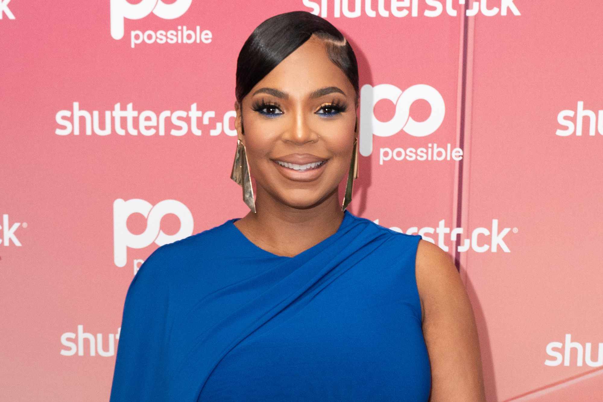 Pregnant Ashanti Shows Off Her 'Sweet Baby' on the Way with Nelly in Curve-Hugging Dress