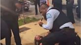 St. Louis Police Officer Lit a Cigar While Straddling Suspect
